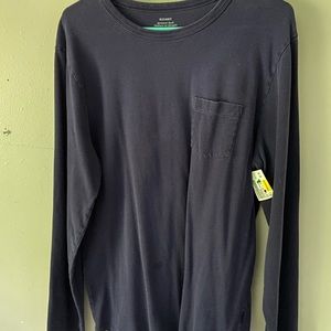 Long sleeve blue shirt with a pocket.